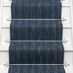 Striped flatweave runner in blue on white staircase