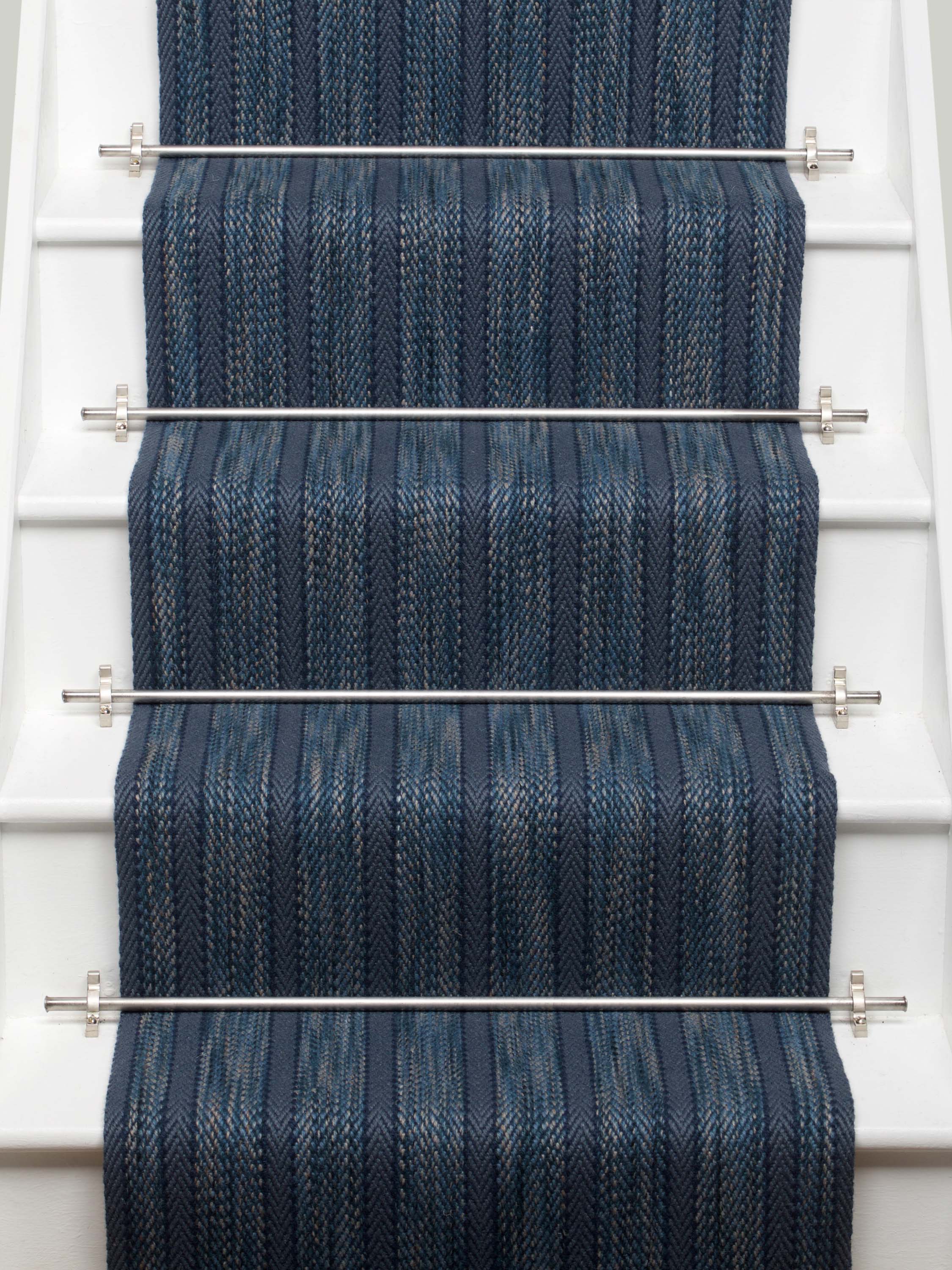 Striped flatweave runner in blue on white staircase