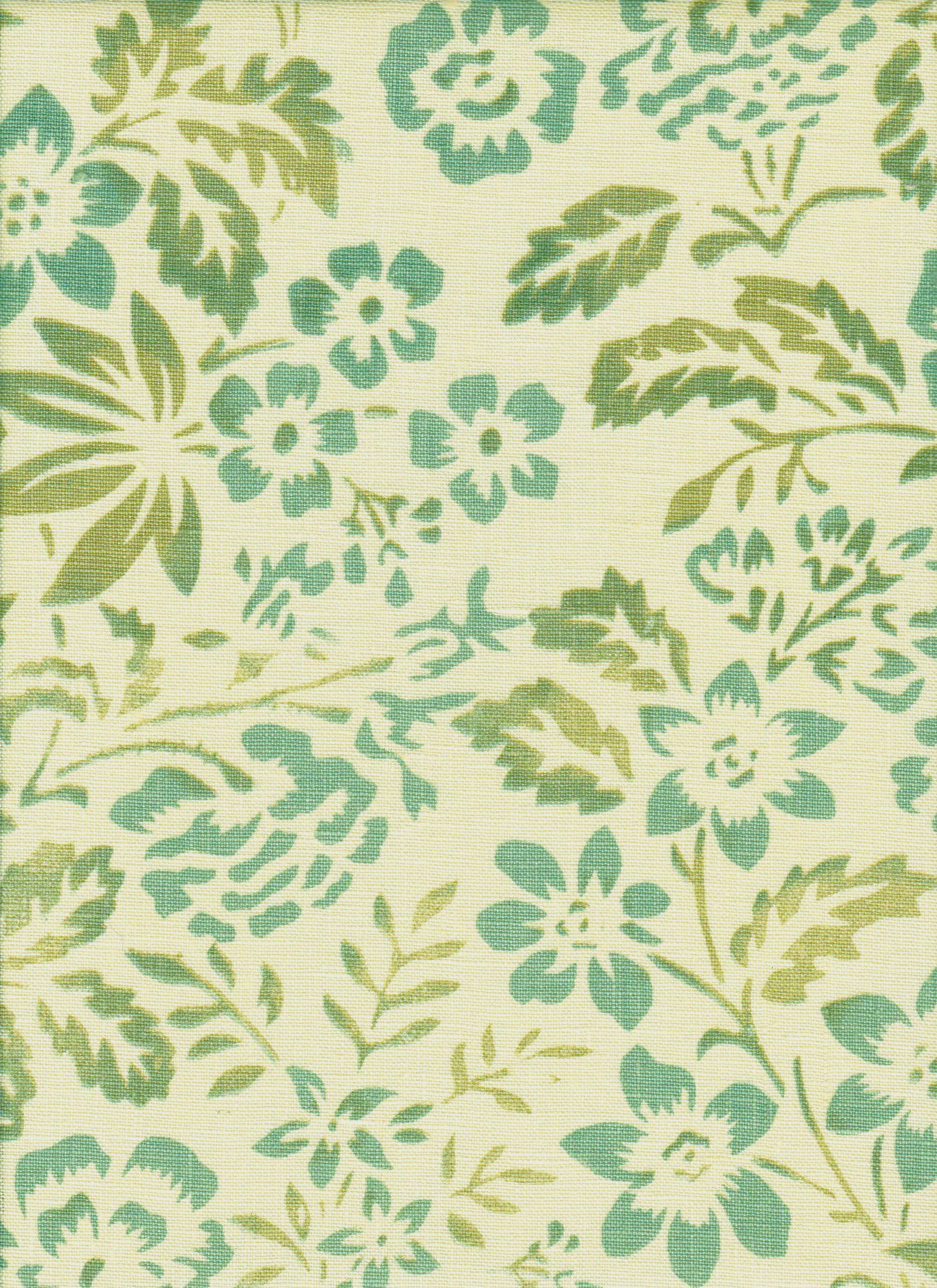 Detail of fabric in a floral print in mottled turquoise and green on a cream field.