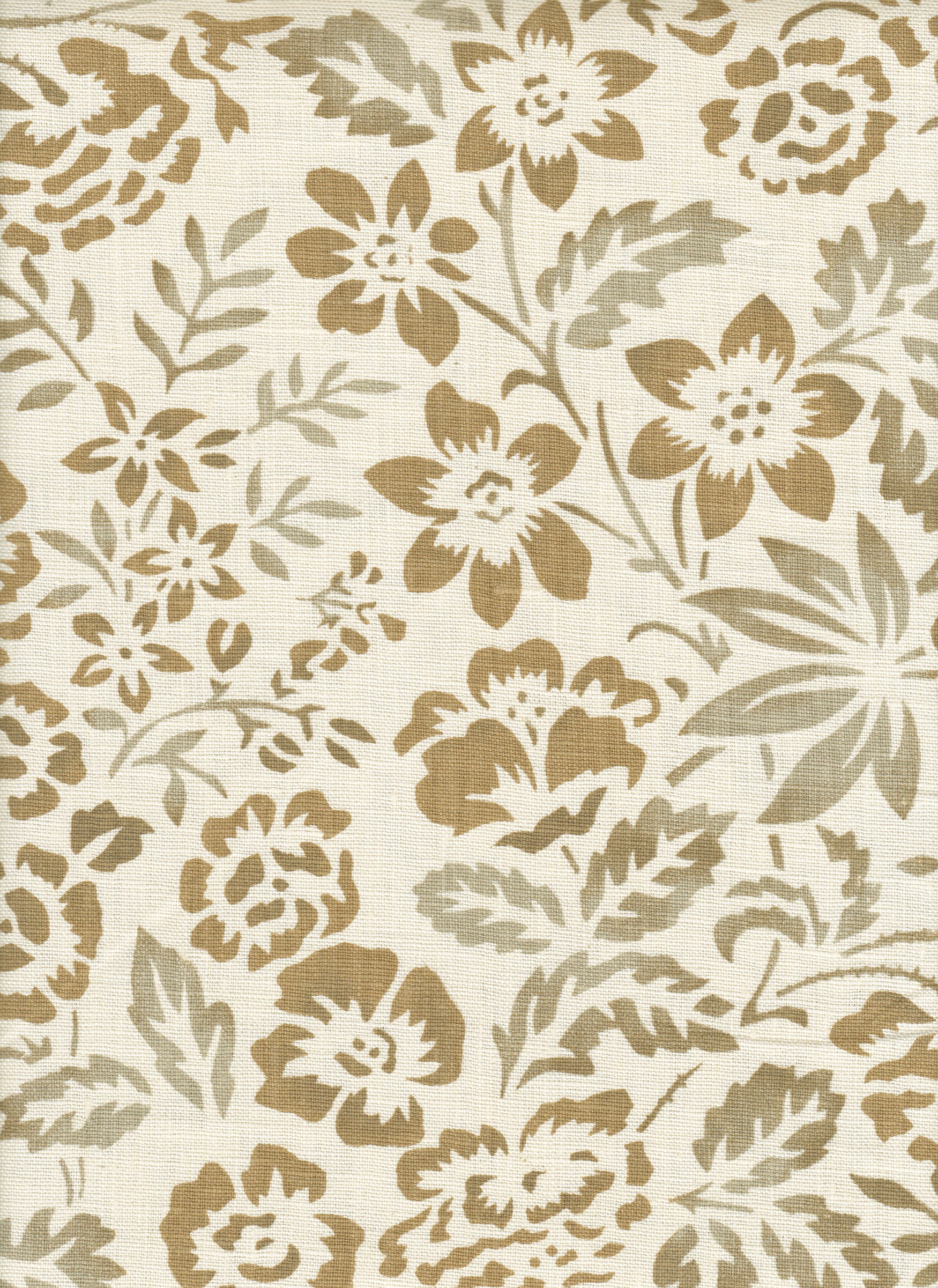 Detail of fabric in a floral print in mottled gray and tan on a cream field.