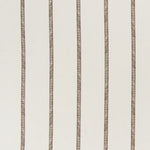 printed linen fabric in a minimal geometric linear pattern in brown on a cream field.