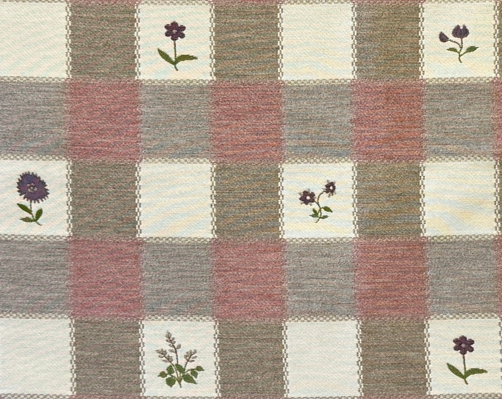 Blush and cream checkered fabric with floral patterns in alternating square