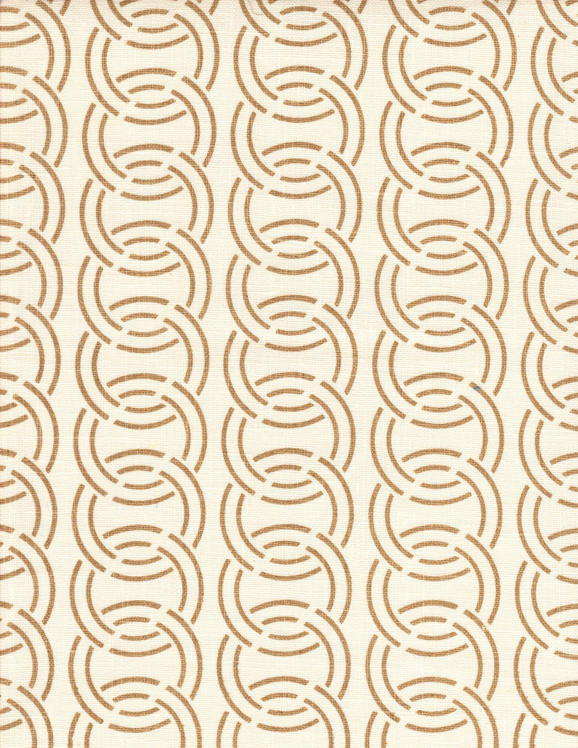 Detail of fabric in an interlocking circular pattern in brown on a cream field.