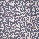 Fabric in an abstract meandering shape print in white and purple on a navy field.