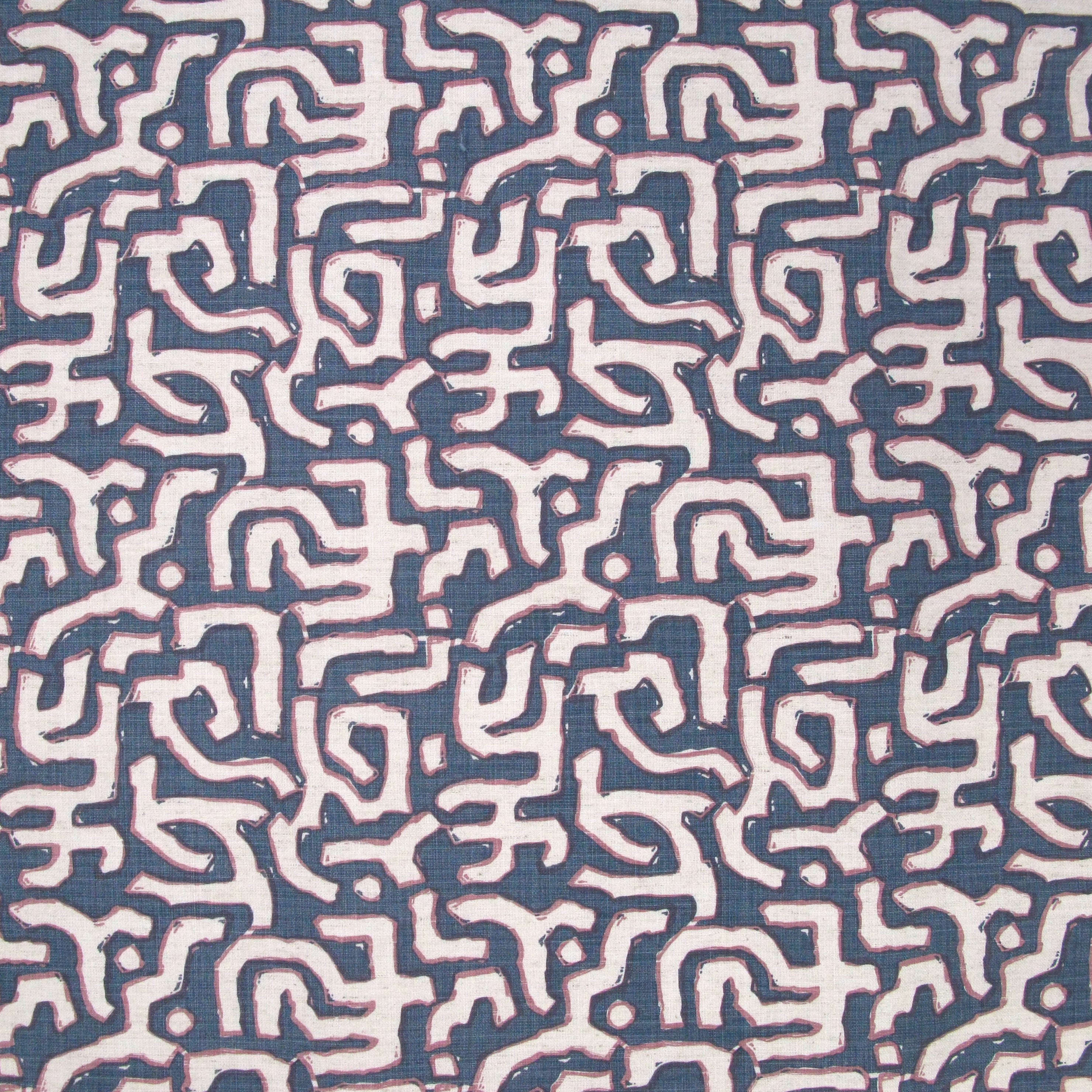 Fabric in an abstract meandering shape print in white and purple on a navy field.