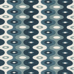 Detail of fabric in a playful curving stripe print in shades of blue, white and navy.