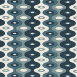 Detail of fabric in a playful curving stripe print in shades of blue, white and navy.