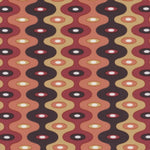 Detail of fabric in a playful curving stripe print in shades of red, mustard and brown.