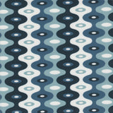 Detail of fabric in a playful curving stripe print in shades of blue, white and navy.