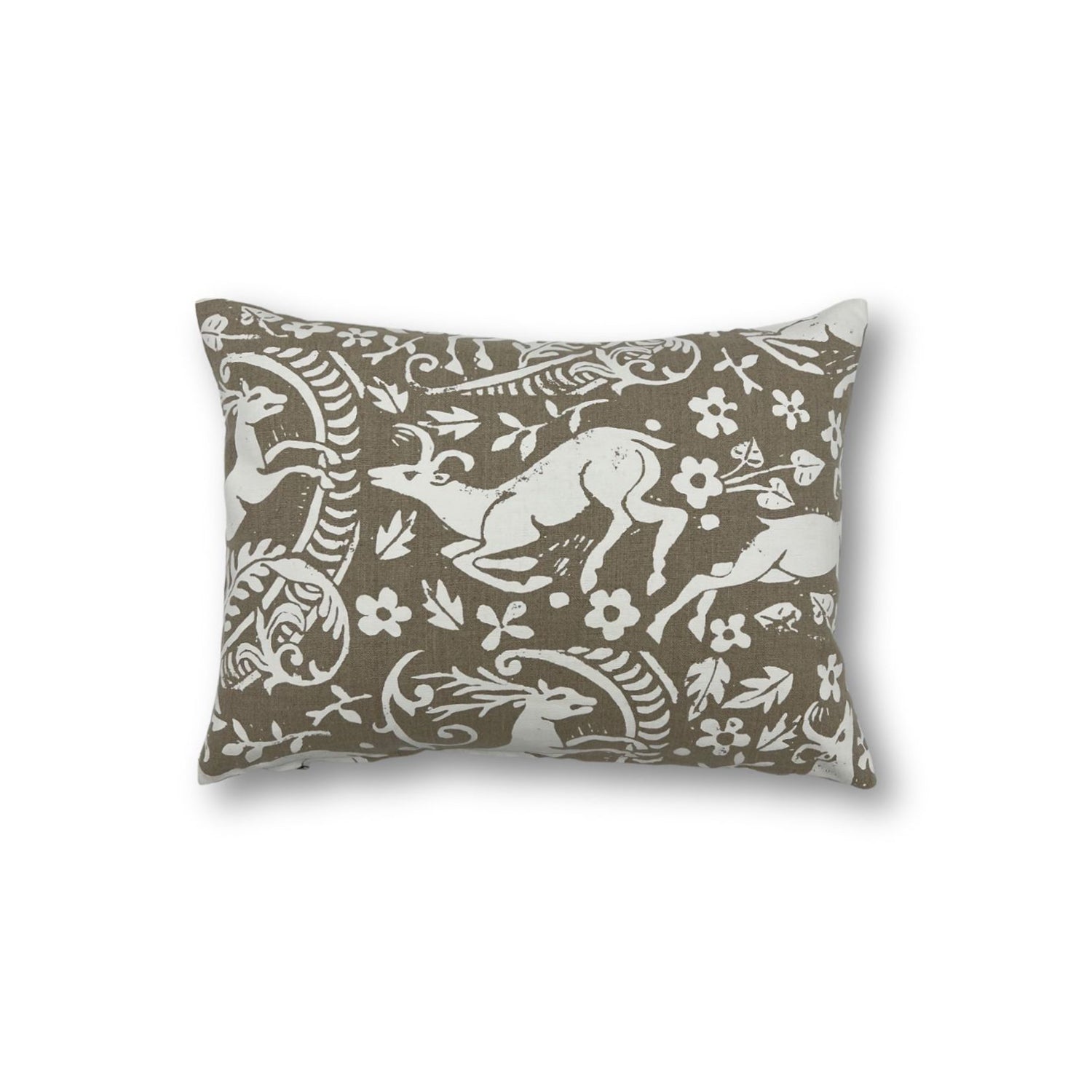 Rectangular throw pillow with a white ram and botanical printed pattern on a natural linen background. 