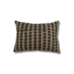 Rectangular throw pillow with a striped pattern made of circles and dashed lines in charcoal grey on a natural linen background.