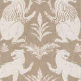 Close-up of wallpaper in a lion and plant print in white on a mottled cream field.