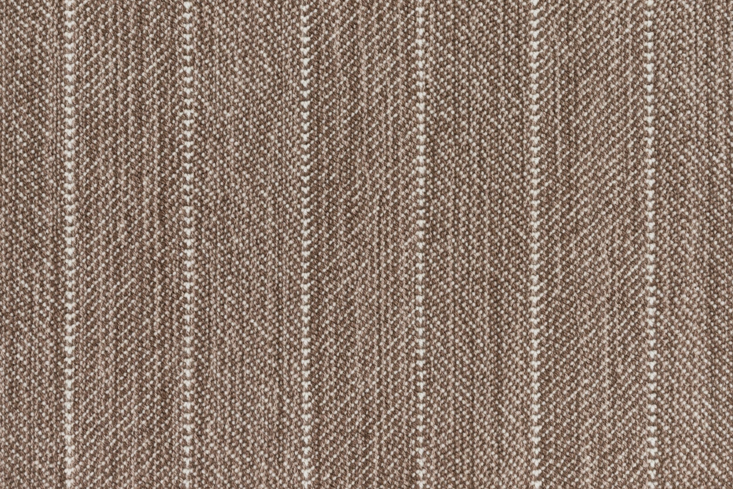 Close-up of a striped herringbone broadloom in brown