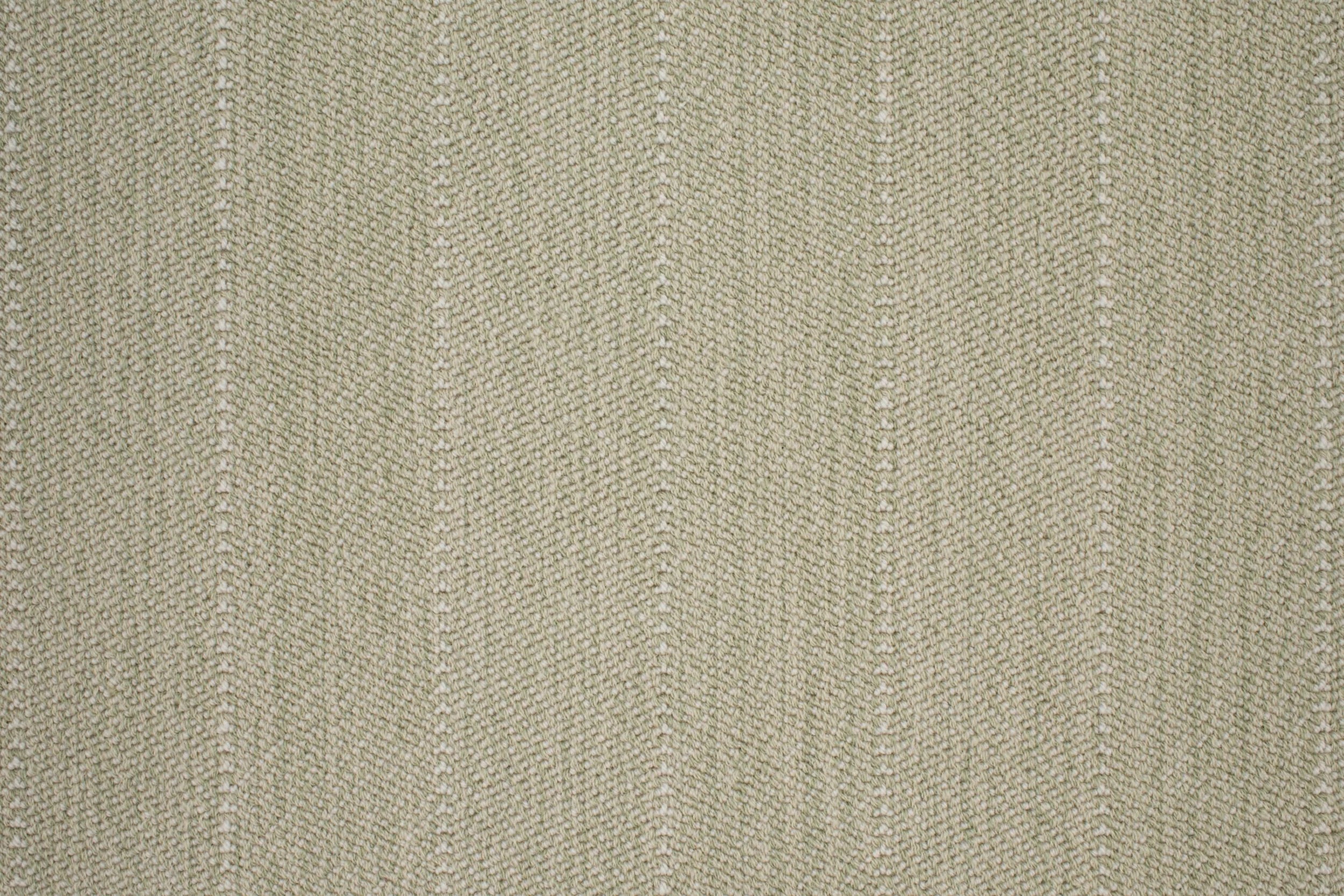 Close-up of a striped herringbone broadloom in pastel green