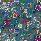 Collection of colorful embroidered patches on a denim fabric background