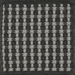 Textured woven outdoor carpet a basketweave design in black and grey.