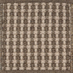 Textured woven outdoor carpet a basketweave design in shades of brown.