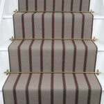 Striped flatweave runner in light grey and brown on white staircase