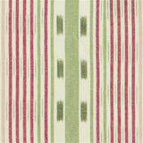 Detail of fabric in a global stripe print in pink, green and maroon on a white field.