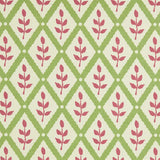 Detail of fabric in a lattice and leaf print in maroon and green on a white field.