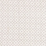 Detail of fabric in a diamond lattice print in brown on a cream field.