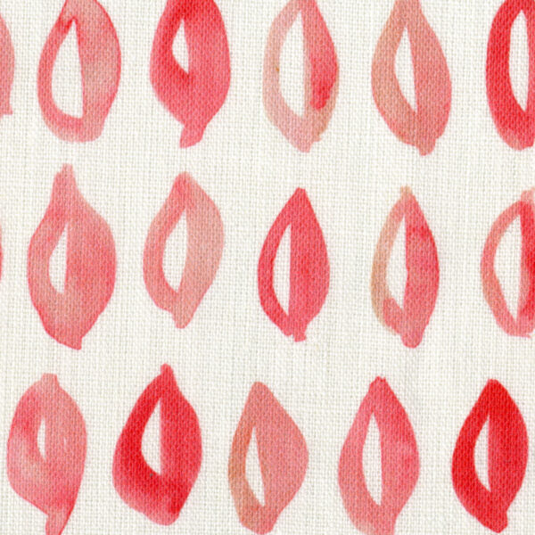 Fabric in a repeating painterly leaf print in shades of pink on a cream field.