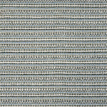 Broadloom carpet with textured stripe in shades of blue and white. 