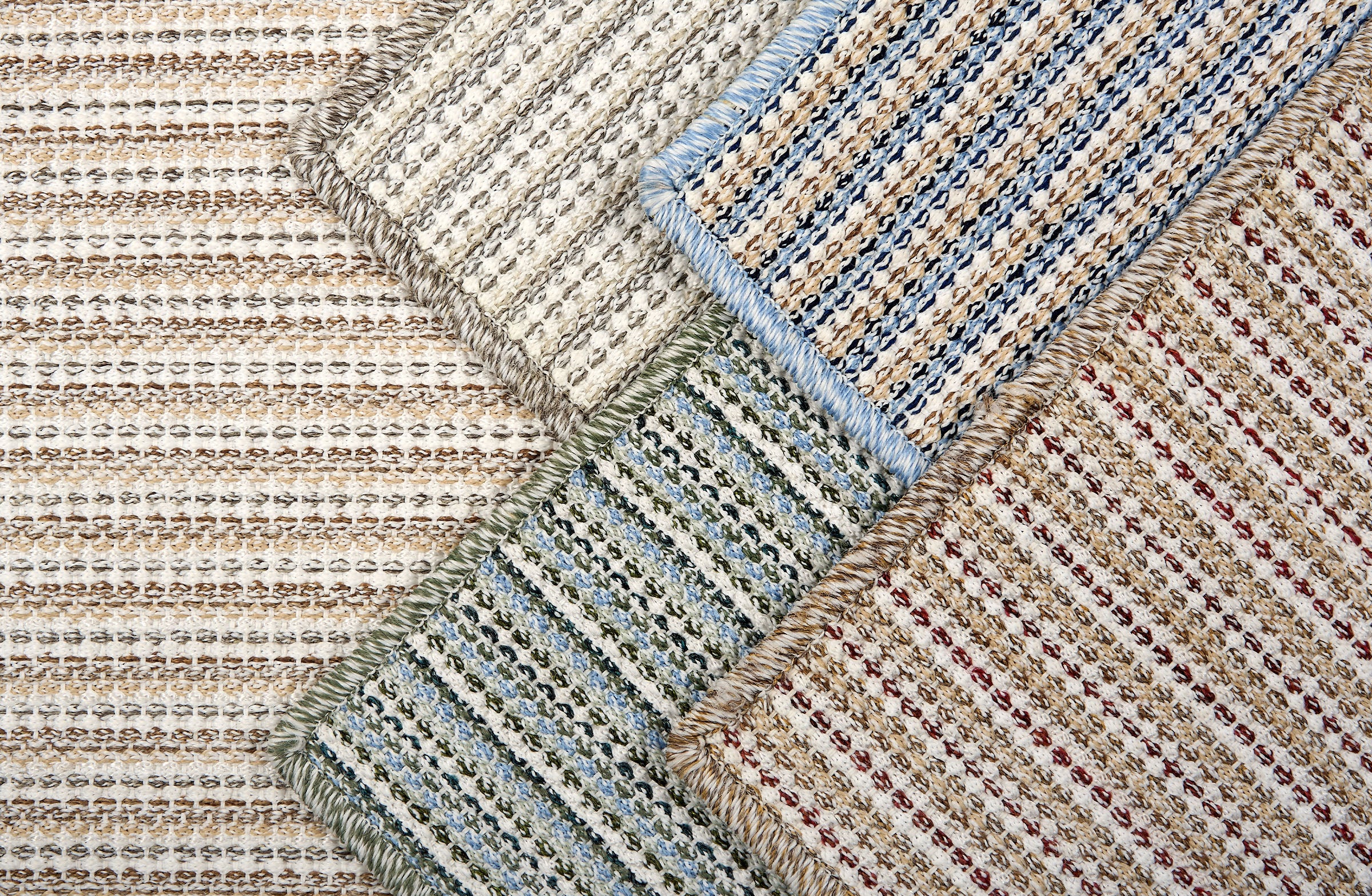 Various broadloom carpet samples in a textural stripe design.