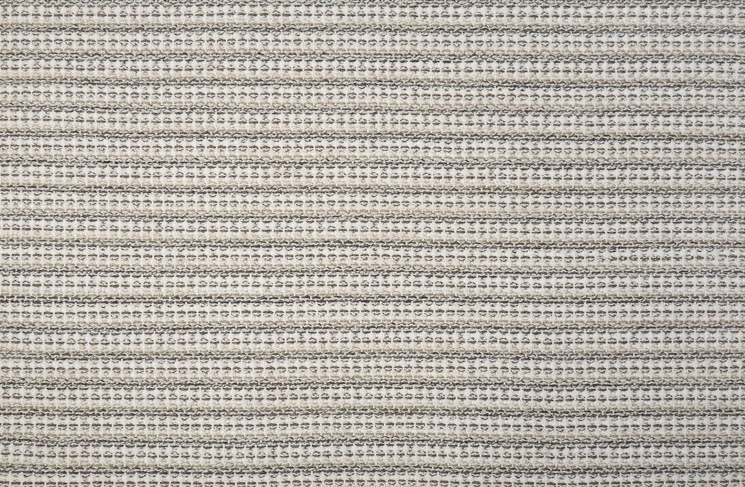 Broadloom carpet with textured stripe in shades of sage green.