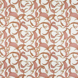 Detail of fabric in an abstract floral print in shades of pink on a cream field.