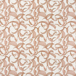 Detail of fabric in an abstract floral print in dusty rose on a cream field.