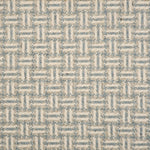 Broadloom carpet with a geometric herringbone design in cream, grey and blue.