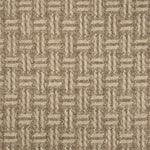 Broadloom carpet with a geometric herringbone design in brown and taupe. 