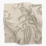 Square fabric swatch in a painterly leaf print in greige on a cream field.
