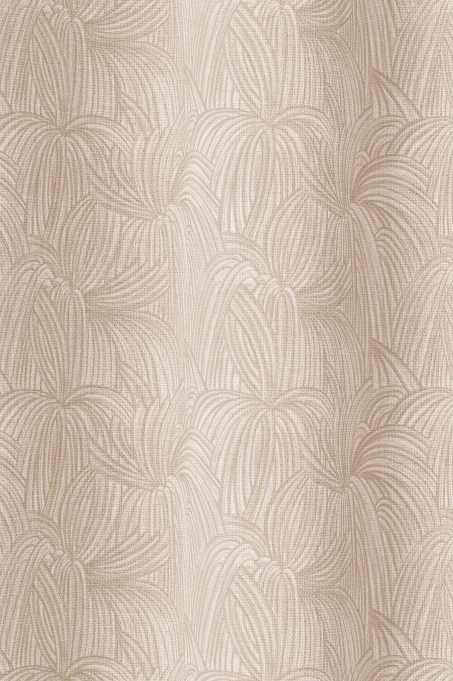 Draped fabric in a textural painted print in tan on a cream field.