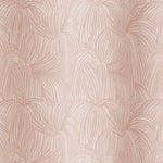 Draped fabric in a textural painted print in blush on a cream field.