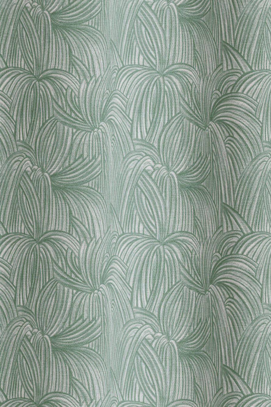 Draped fabric in a textural painted print in sage on a cream field.