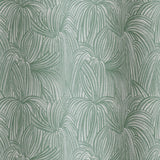 Draped fabric in a textural painted print in sage on a cream field.