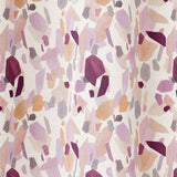 Draped fabric in an abstract shape print in shades of purple, maroon and orange on a cream field.
