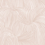 Detail of wallpaper in a textural painted print in blush on a cream field.