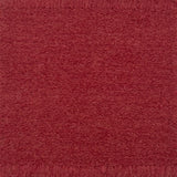 Bouclé rug in coral pink. 