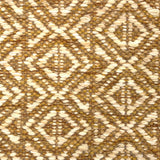 Handwoven rug detail in a diamond design in mustard and beige