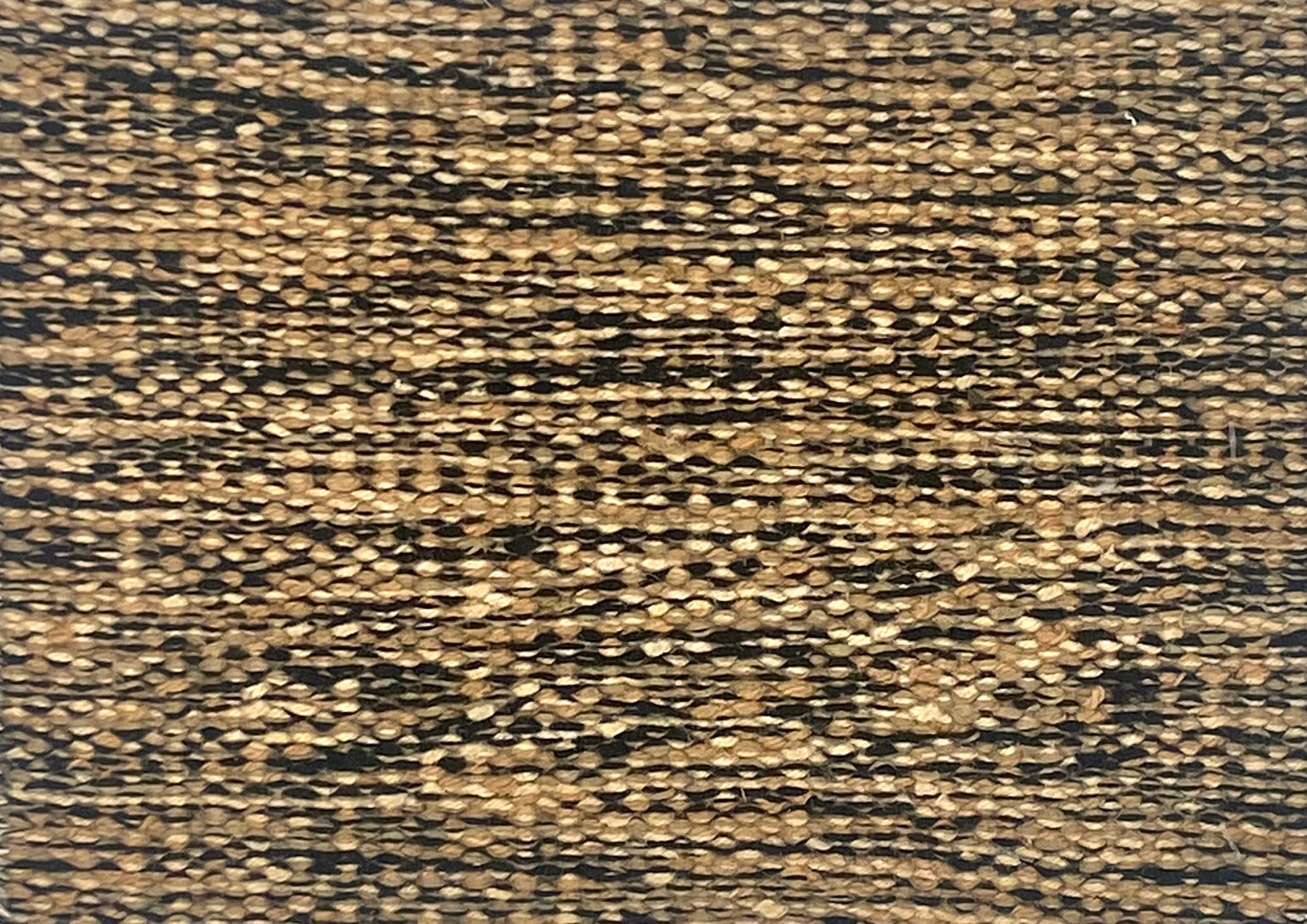 Textured brown and black patterned flatweave carpet