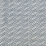 Indoor-Outdoor rug in a diamond basket weave in white and blue.