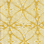 Detail of fabric in a botanical geometric print in shades of yellow and white.