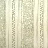 Detail of fabric in a botanical stripe print in greige on a cream field.