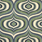 Detail of fabric in a curvilinear geometric print in shades of blue, green and navy on a cream field.