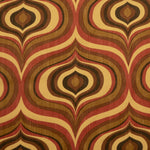 Detail of fabric in a curvilinear geometric print in shades of red, brown and black on a yellow field.