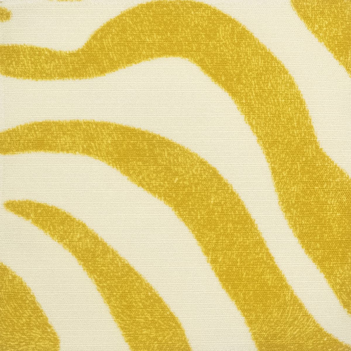 Detail of fabric in a zebra print in yellow on a cream field.