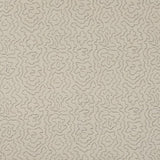 Detail of fabric in a minimalist wood grain print in gray on a cream field.